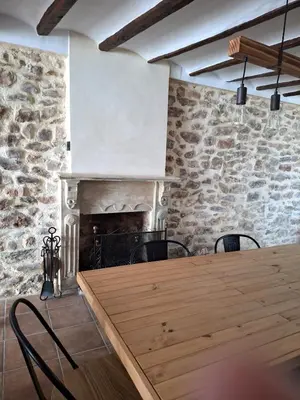 a stone room with a stone wall and a ceiling at Casa Trilles in Azuébar