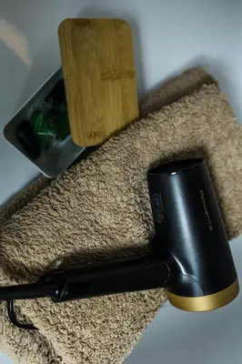 a hair brush sitting on top of a carpet at Canoa Studio Valencia in Valencia