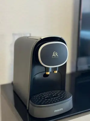 a coffee maker sitting on top of a counter at Apartment Monfort in Valencia