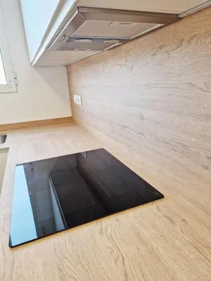 a room with a black mat on the floor at Cabanyal playa las arenas apartamento reformado in Valencia