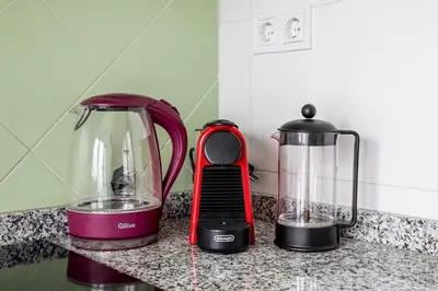 a kitchen counter with a blender and a blender at Guest Ready - Bright flat well‑located urban stay in Valencia