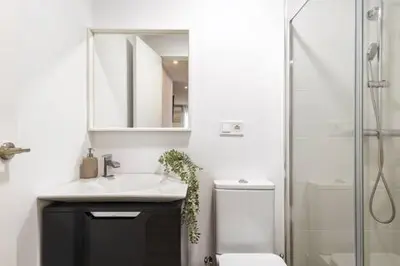 a bathroom with a sink and a shower and a toilet at Estrella Maya Escapada Tranquila con encanto único in Torrent