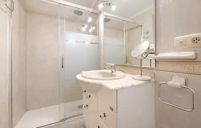 a bathroom with a sink and a shower at 4 Bedroom Stunning Home In Sueca in Sueca