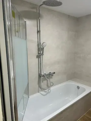a shower in a bathroom with a bath tub at Villa Noelia in Turís