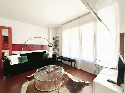 a living room with a glass table and a couch at Centro Histórico Valencia 2 Hab in Valencia