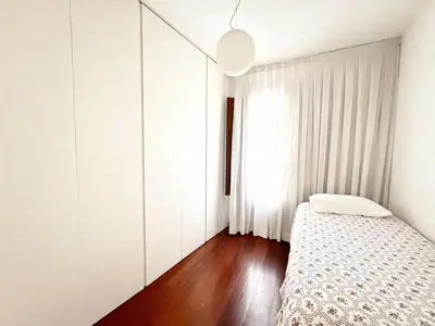 a small bedroom with a bed and a window at Centro Histórico Valencia 2 Hab in Valencia