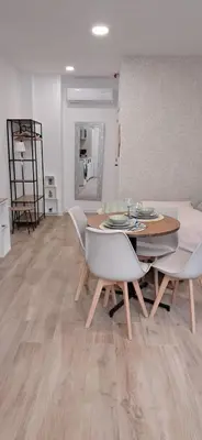 a bathroom with a shower with a toilet and a glass shower at ConchaBeach Valencia in Valencia