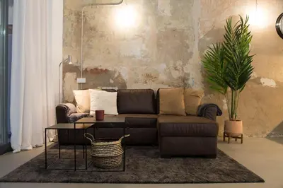 a living room with a couch and a table at Can Turia in Valencia