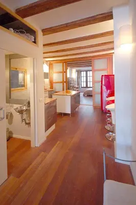 a large room with a kitchen and a living room at Beds & Breaks Ravel I in Valencia