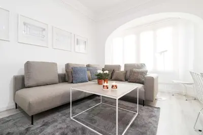 a living room with a couch and a table at Valencia Luxury - Boutique Center in Valencia