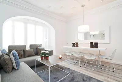 a living room with a couch and a table at Valencia Luxury - Boutique Center in Valencia