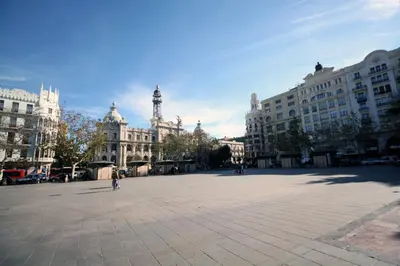 a large plaza with buildings and a clock tower at Travel Habitat Ayuntamiento in Valencia