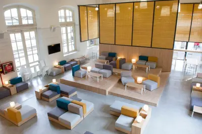 an overhead view of a waiting room in a building at UP Hostel Valencia in Valencia