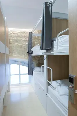 a bunk room with two bunk beds in it at UP Hostel Valencia in Valencia
