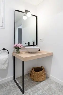 a bathroom with a sink and a mirror at Victoria Site-Luxury Center in Valencia