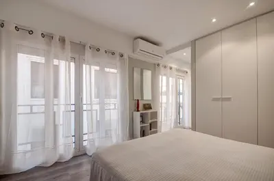 a living room with a couch and a table at Beds & Breaks Casals in Valencia