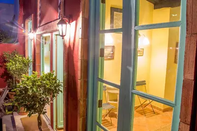 a window view of a room with a table at Villa Lupita in Alquerías del Niño Perdido