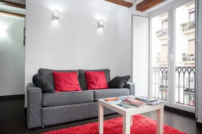 a living room with a couch and a table at Apartment Boutique in Valencia