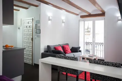 a living room with a couch and a table at Apartment Boutique in Valencia