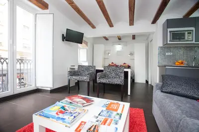 a living room with a couch and a table at Apartment Boutique in Valencia