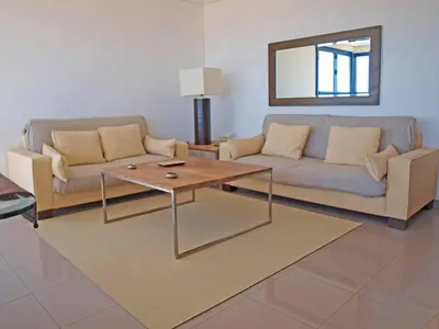 a living room with two couches and a coffee table at ApartUP Patacona Panoramic in Valencia