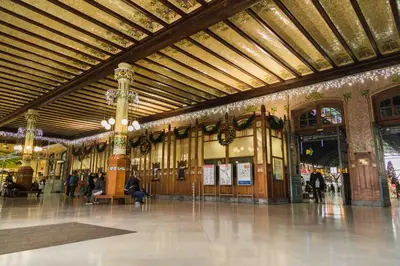 a lobby of a building with people in it at MD Pelayo in Valencia