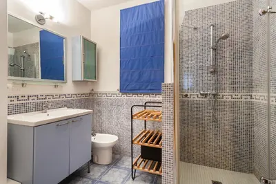 a bathroom with a shower and a sink and a toilet at My Loft 4 You Borgia in Valencia