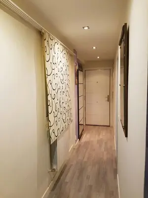 an empty hallway with a door and a hallway at Balandra Flat in Valencia