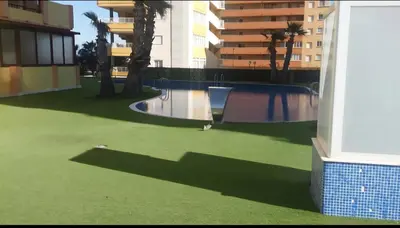 a view of a swimming pool in a building at Apartamento con Vista al Mar in Tavernes de Valldigna