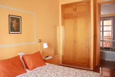 a bedroom with a bed and a window and a door at B&B 
