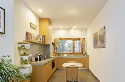 a kitchen with a sink and a table in it at Barracart Apartments in Valencia