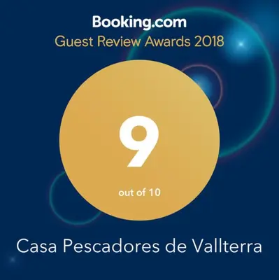 a yellow circle with the number nine on it at Casa Pescadores de Vallterra in El Palmar