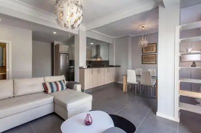 a living room with a couch and a table at Apartment City of Arts and Sciences 1 in Valencia