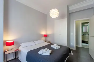 a bedroom with a bed with two towels on it at Apartment City of Arts and Sciences 1 in Valencia