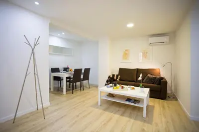 a living room with a couch and a table at El Micalet Apartment in Valencia