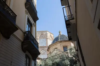 a view of a building from between two buildings at El Micalet Apartment in Valencia