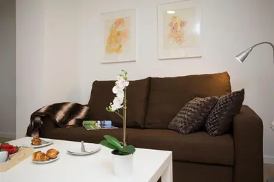 a living room with a couch and a table at El Micalet Apartment in Valencia