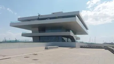 a large building with a lot of windows at APARTMENTSUITESPAIN Beach Economy in Valencia