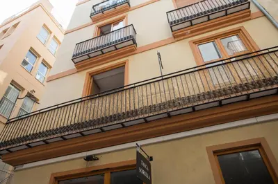 a building with balconies on the side of it at Apartment Collado in Valencia