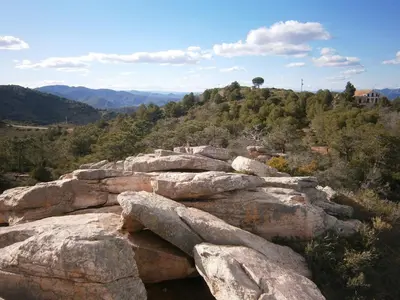 a group of rocks on top of a mountain at Casa Rural La Tramontana in Estivella