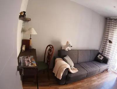 a living room with a couch and a table at Valencian Apartment in Valencia