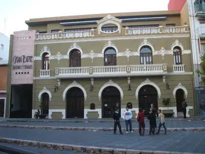 a group of people standing in front of a building at Hostal Mitre Paterna in Paterna