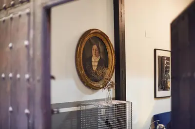 a framed picture of a man on a wall at Bubusuites in Valencia