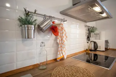 a kitchen with a sink and a counter top at Habana Apartment in Valencia