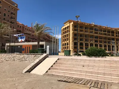 a group of stairs in front of a building at Apartamento PortSaplaya in Port Saplaya