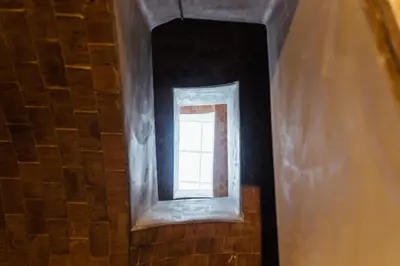 a stairway with a window in a building at OttoH Charm Stay in Valencia
