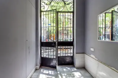 a door in a room with a stained glass window at Ruzafa Luis Santangel in Valencia