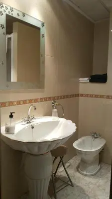 a bathroom with a sink and a toilet at Hotel Beatriz in Burriana