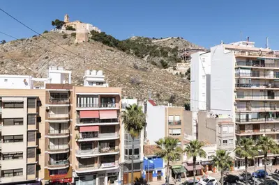 a group of buildings in front of a mountain at Europa B 6º-23 in Cullera