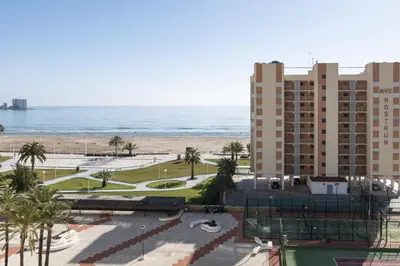 a view of the beach and the ocean from a resort at Florazar 1, I-A 7-B in Cullera